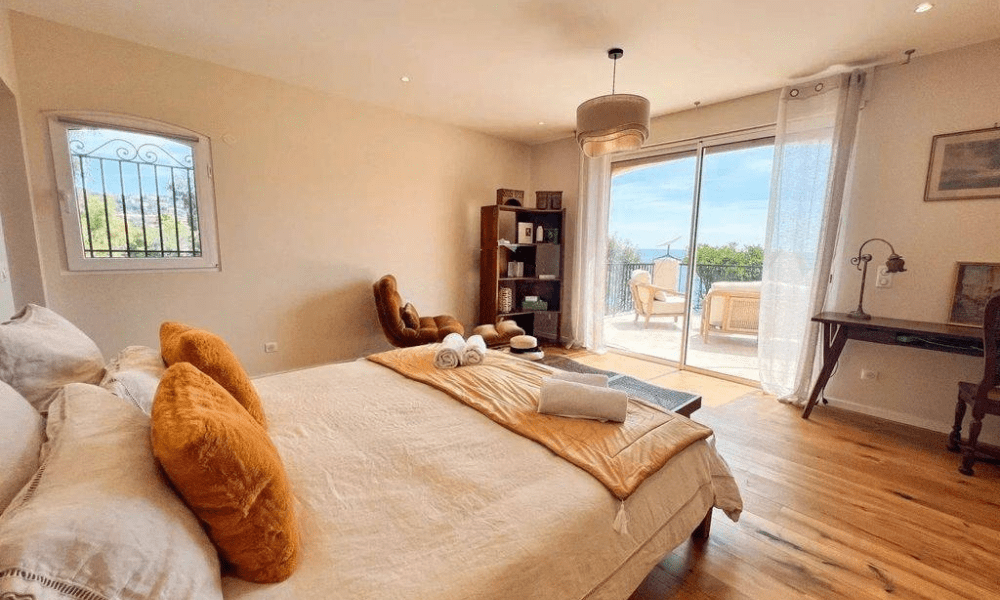 Interior lounge space with coastal art and natural light